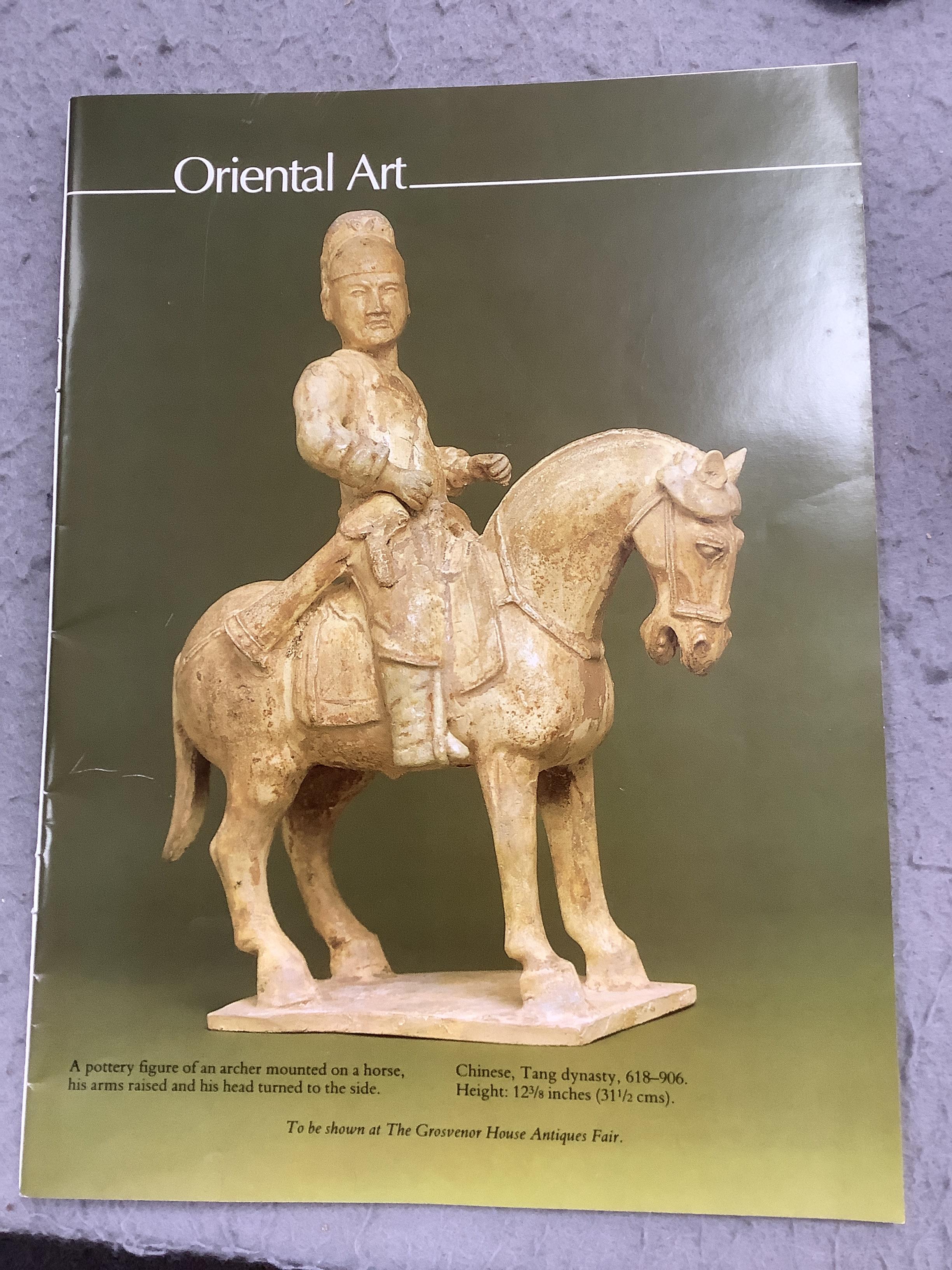 A Chinese cream glazed pottery model of an archer on horseback, Tang Dynasty (618-906 AD)